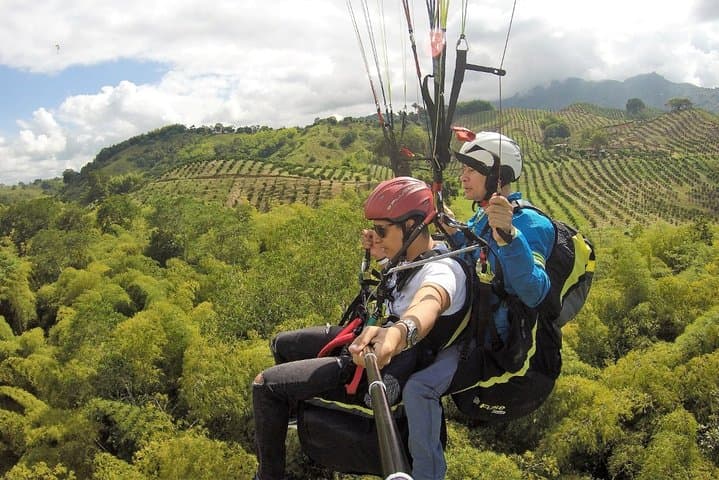 Flying Paragliding Day Trip at Calarca
