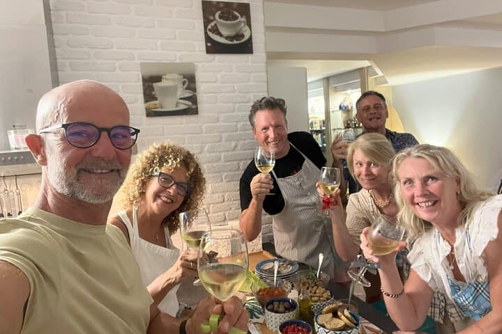 Make pasta, drink wine. Cooking class with transported included! 